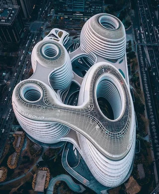 Aerial view of Galaxy SOHO and its four linked curved buildings in Beijing