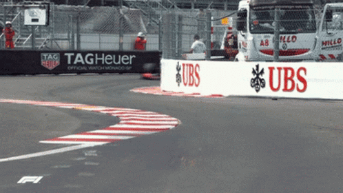 Formula One cars moving through a race sequence